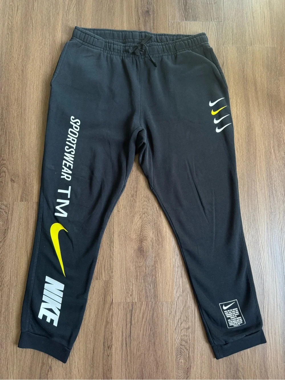 Nike Black Sweat Suit with White and Yellow Swoosh Logos